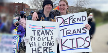 Young activists protest against a slate of Republican anti trans bills outside of the New Hampshire State House in March 2023. (Colin Booth/Granite Post)